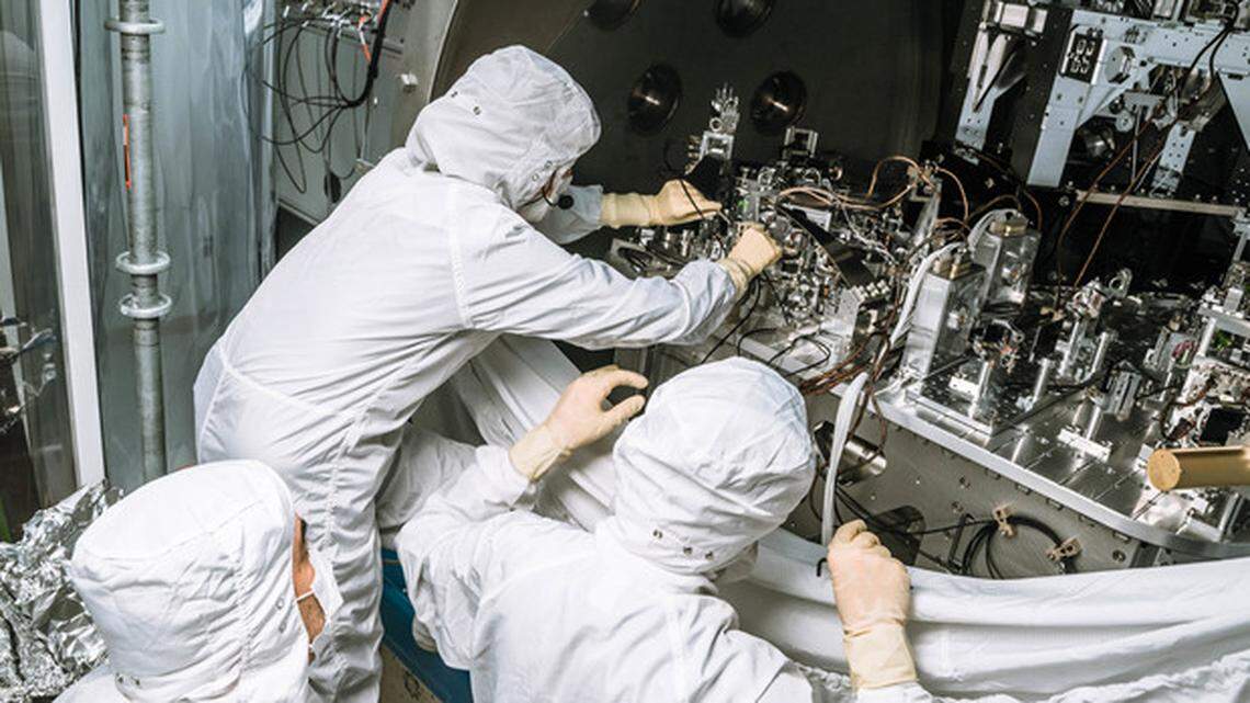 LIGO Hanford engineers swap out a fiber cable in a vacuum squeezer during the October 2019 commissioning break at the observatory near Richland, Wash., one of two in the nation.