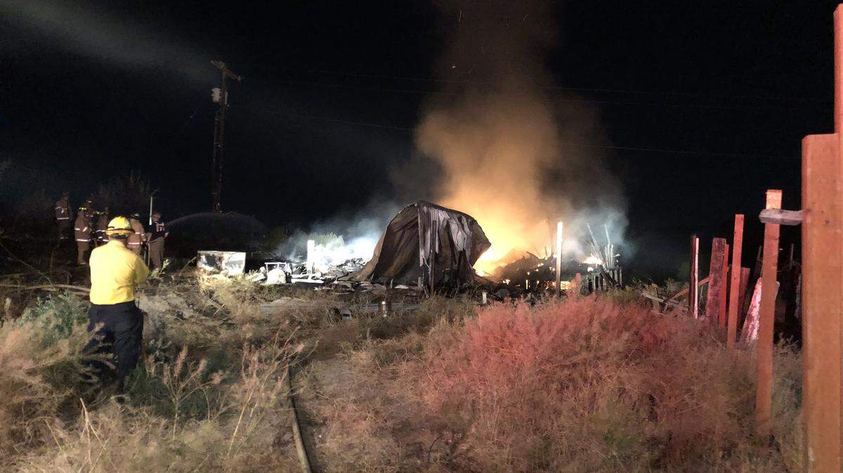 A late night Tuesday fire demolished an empty manufactured home off in Badger Canyon west of Kennewick.
