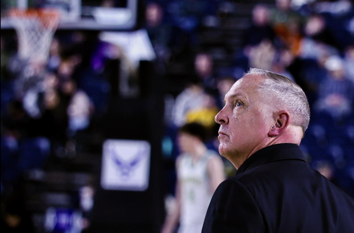 Richland head coach Earl Streufert looks toward the scoreboard during the final minute of the fourth quarter in the WIAA Class 4A boys state championship game.