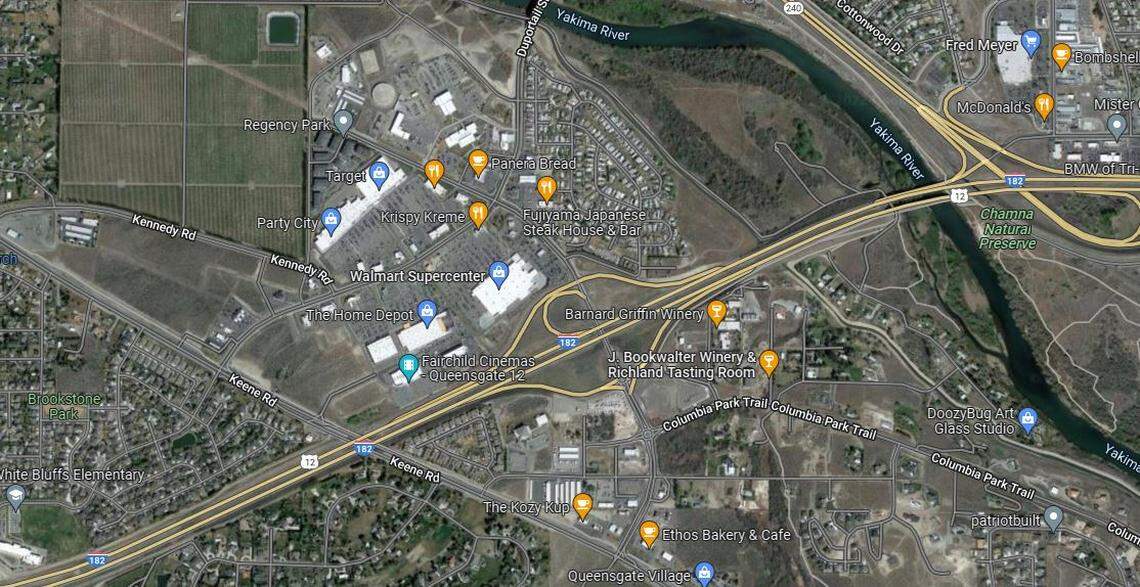 Richland police are looking for two people connected to hitting a police officer while escaping from officers during a shoplifting.