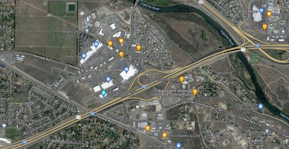 Richland police are looking for two people connected to hitting a police officer while escaping from officers during a shoplifting.
