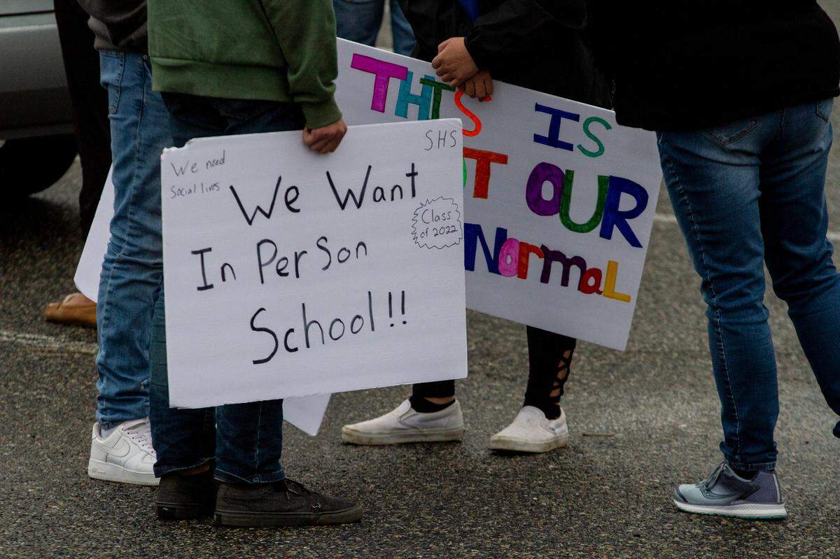 Students from Tri-Cities schools met in Richland on Friday afternoon to demonstrate their desire to reopen schools for in-person learning after months of virtual classes due to the ongoing coronavirus pandemic.