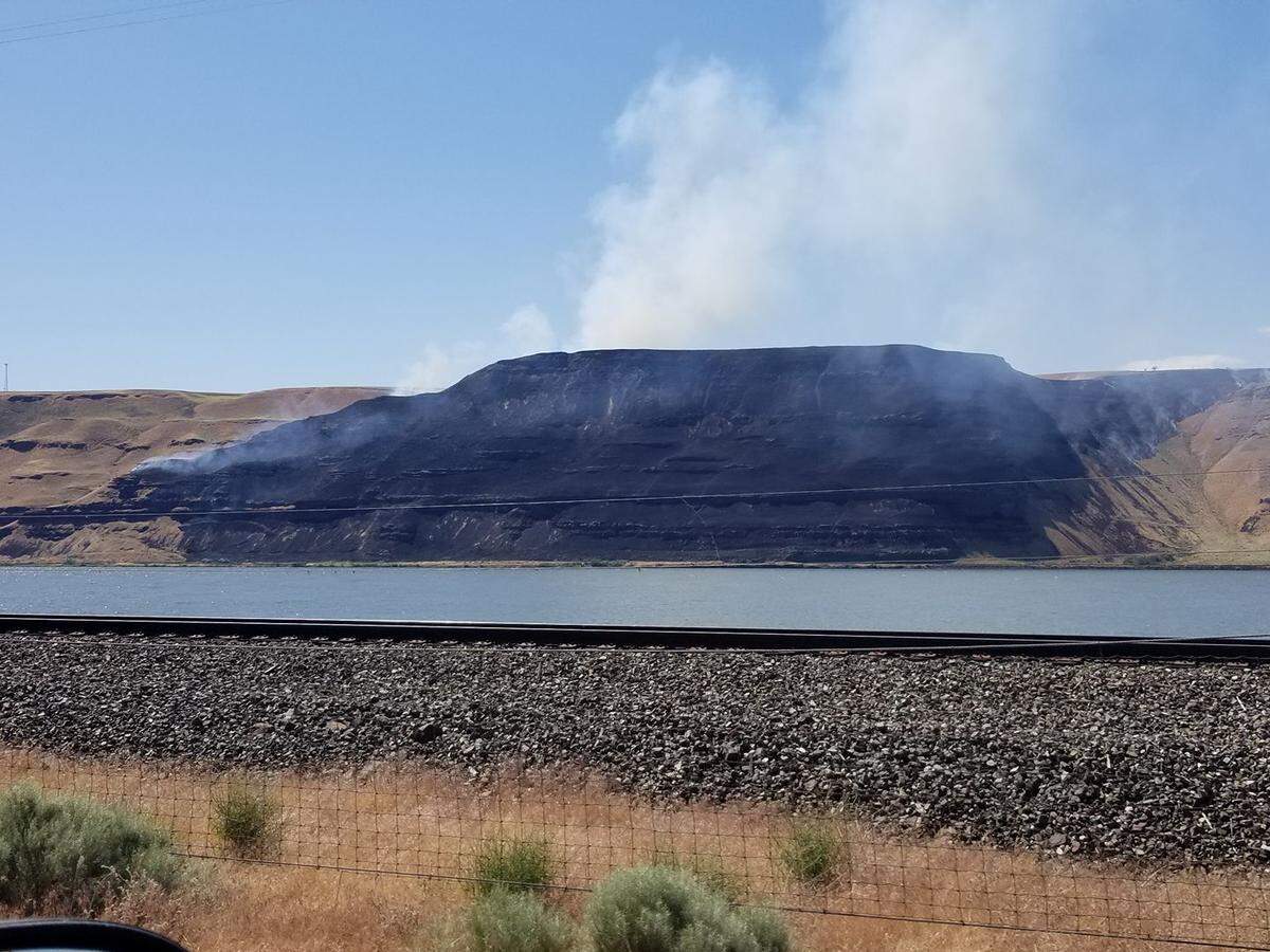The hill below Les Blair Road in Benton County is blackened by wildfire June 4, 2018. Jenni Seelye of Burbank took this photo near the Washington-Oregon border along Highway 730.