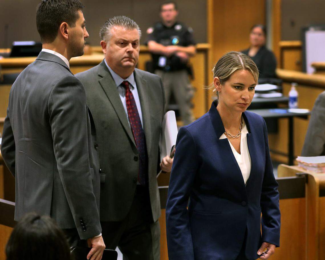 Trooper Sarah Clasen leaves Benton County Superior Court with her defense attorney Scott Johnson following her arraignment in 2025 in the vehicular homicide death of a Richland motorcyclist.