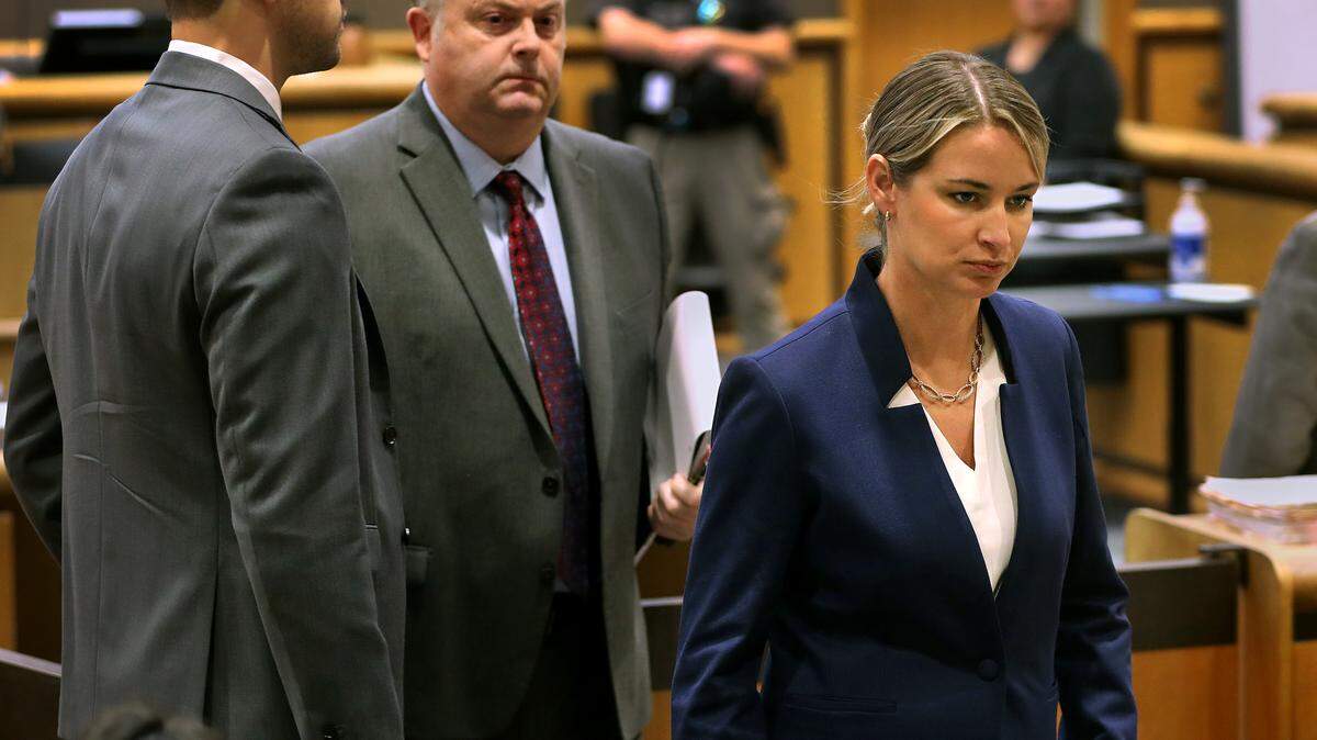 Sarah Clasen, 35, leaves Benton County Superior Court with her defense attorney Scott Johnson following her arraignment in Kennewick. 