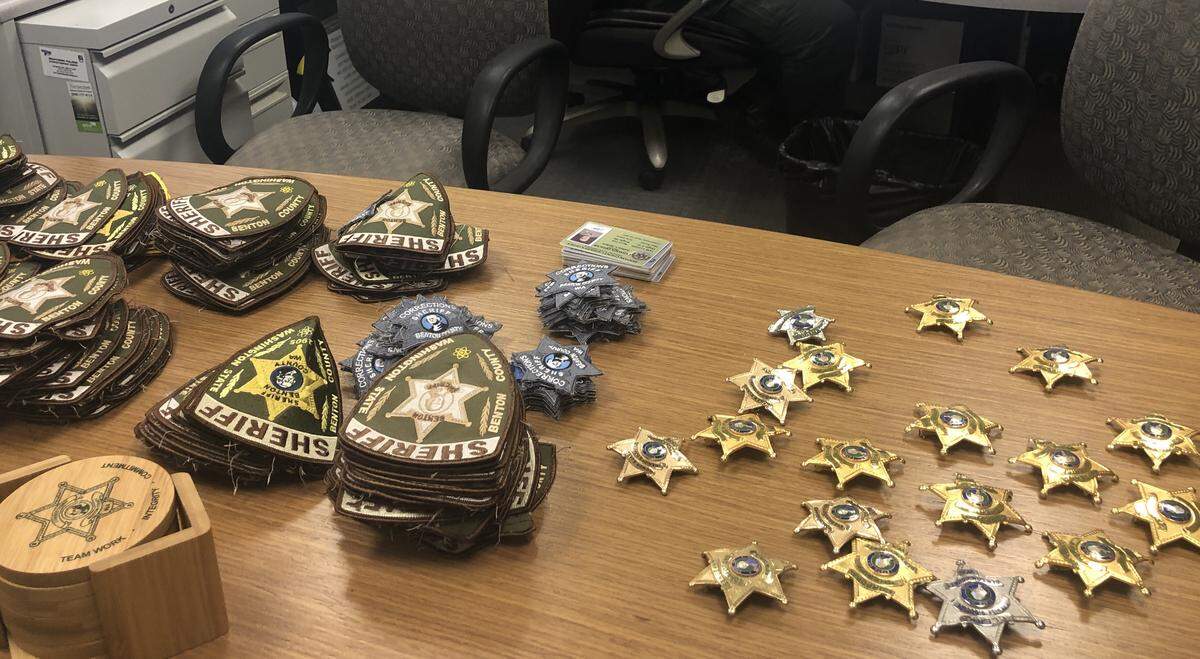 Benton County Sheriff Jerry Hatcher ordered corrections deputies to remove badges from their uniforms after the county commission voted to take over the jail.