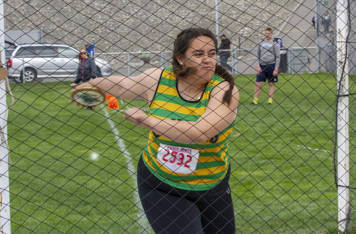 Richland’s Madeline Mauia competes in the girls discus throw during the 58th Pasco invite track and field meet on Saturday at Edgar Brown Stadium. Mauia placed seventh.