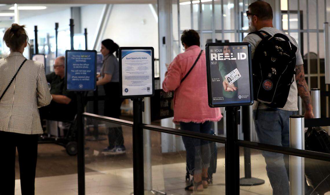 Passengers move through the Tri-Cities Airport TSA screening line on the first day TSA began requiring travelers show Real ID to travel on commercial airlines.