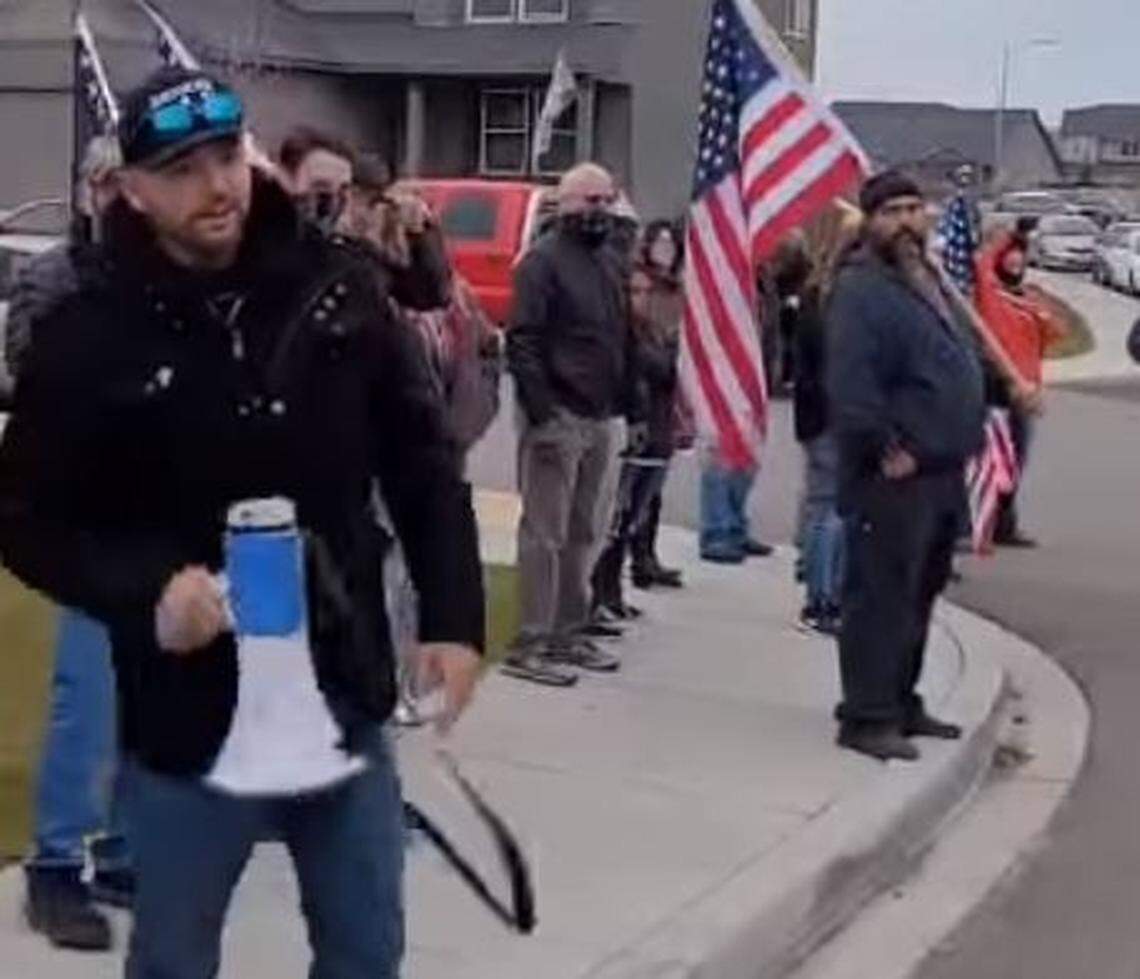 About a dozen people including Patriot Prayer leader Joey Gibson stood outside of a Tri-Cities liquor agent’s house and called for him to ‘stand down’ and stop enforcing restrictions on indoor dining during the most recent coronavirus lockdown.