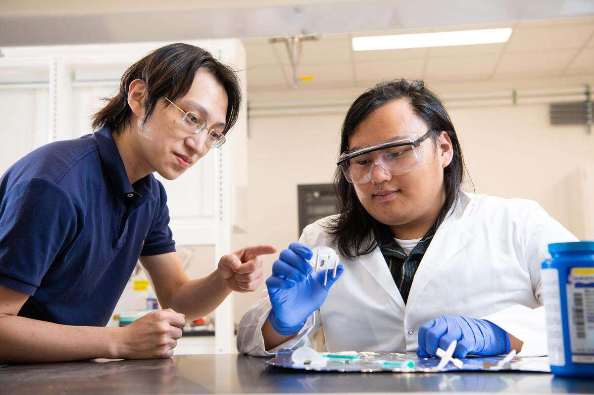 PNNL intern Andrew Tong, right, shown here with one of his mentors, Tingkun Liu, is supporting the study of hydrogen embrittlement in stainless steel for an Office of Science-funded Early Career Research Program. His research could help improve materials used to store and transport this carbon-free fuel in the future.