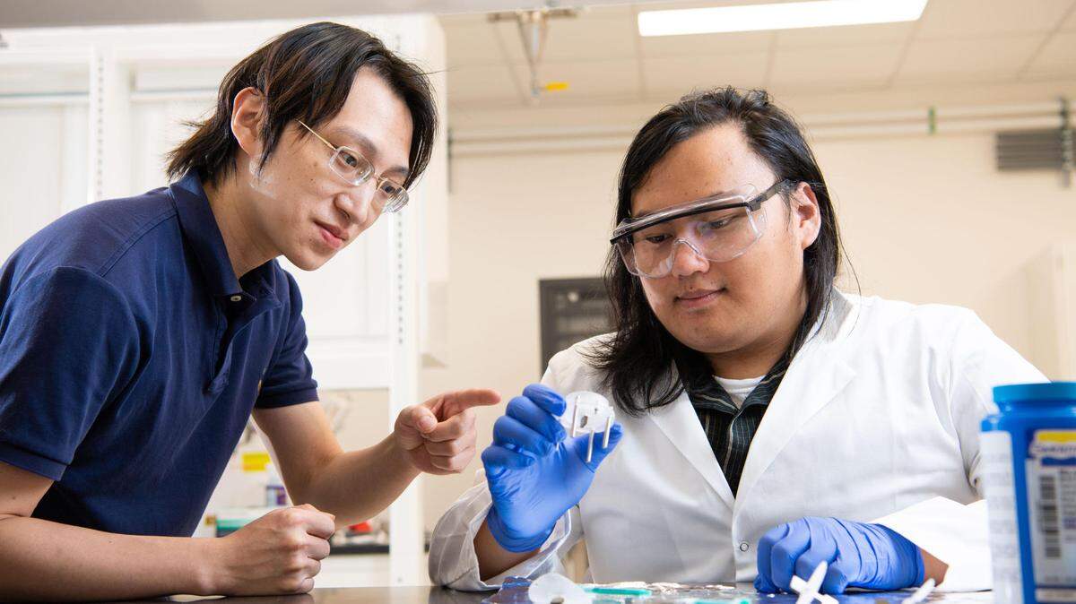 PNNL intern Andrew Tong, right, shown here with one of his mentors, Tingkun Liu, is supporting the study of hydrogen embrittlement in stainless steel for an Office of Science-funded Early Career Research Program. His research could help improve materials used to store and transport this carbon-free fuel in the future.