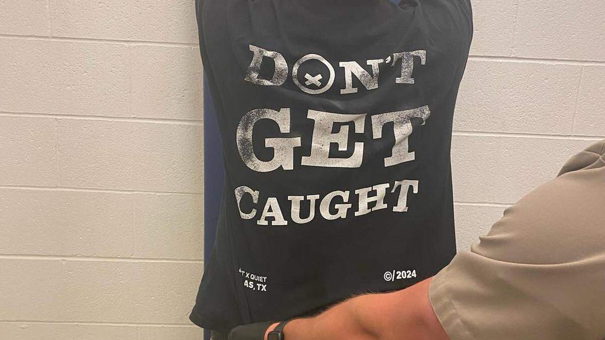 Trevor Delorme was arrested wearing a shirt that said “Don’t Get Caught” after fleeing from police at 130 mph.
