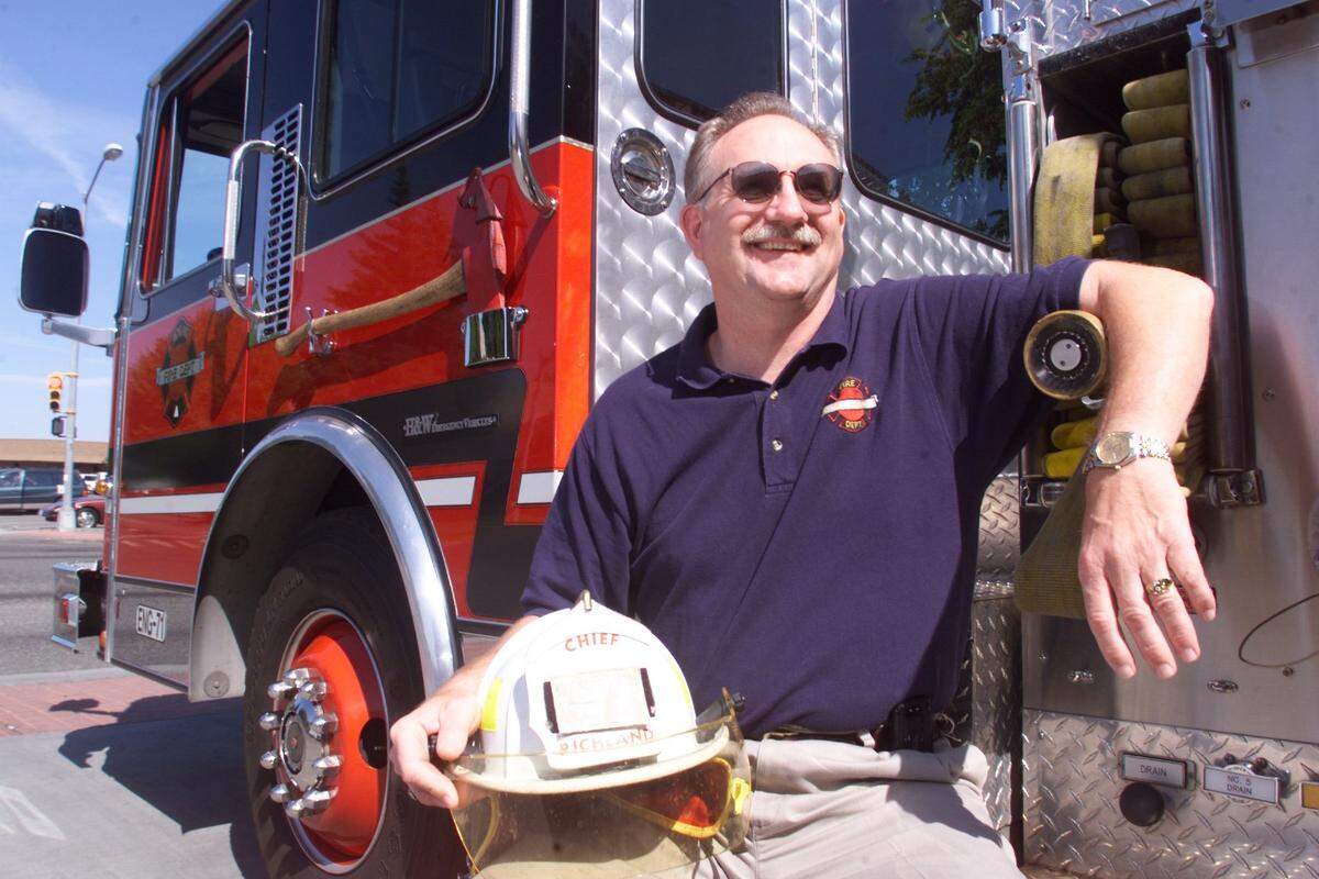 Former Richland Fire Chief Craig Williamson posed for a photo when he retired in 1999.