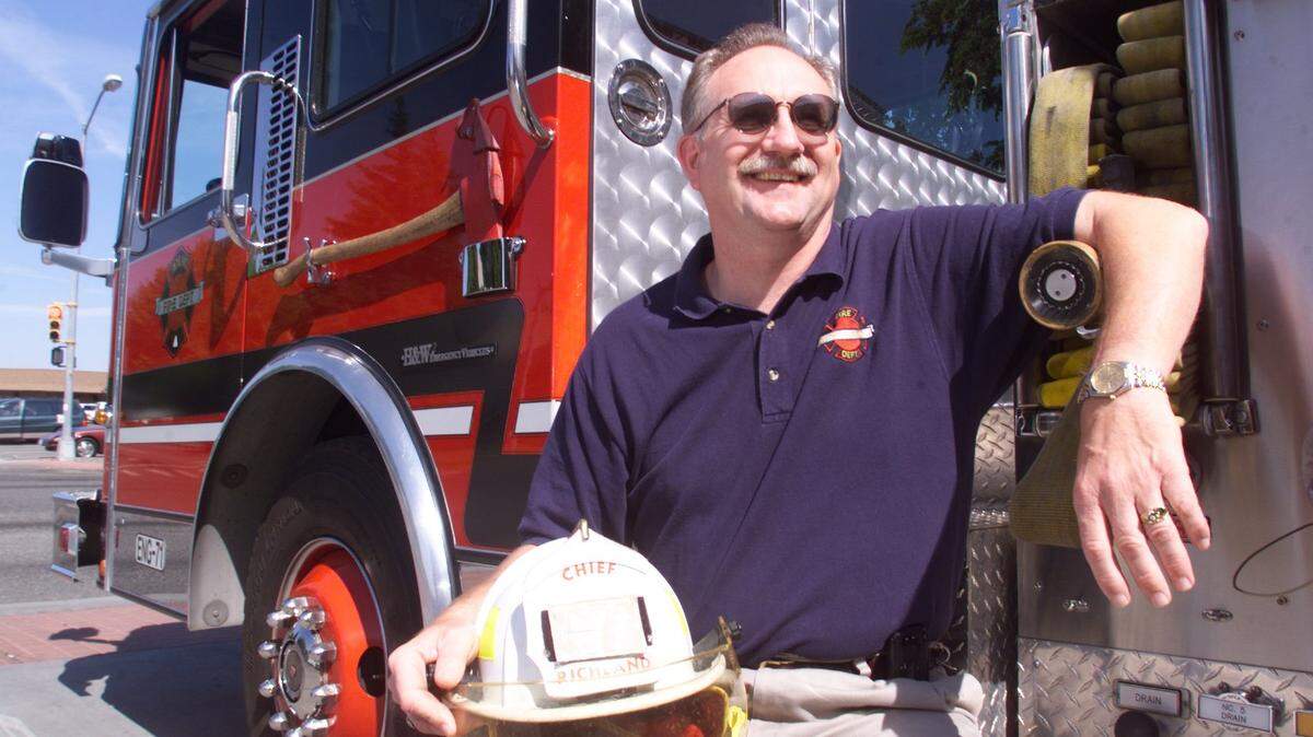 Former Richland Fire Chief Craig Williamson posed for a photo when he retired in 1999.