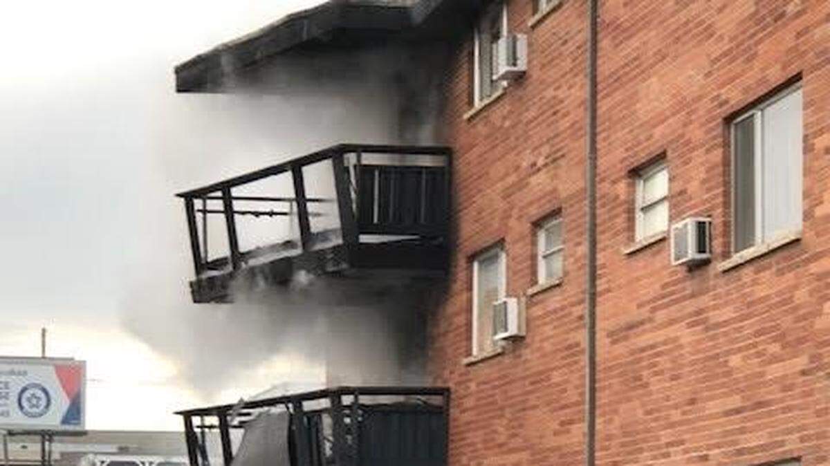 Firefighters arrived Friday afternoon at the Dolphin Apartment complex in Kennewick to find fire burning on two floors.