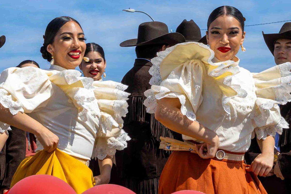 Folkloric dancers perform during Pasco’s Cinco de Mayo parade on Saturday in downtown Pasco. Colorful traditional dresses, music, and cultural performances were featured throughout the annual community celebration.