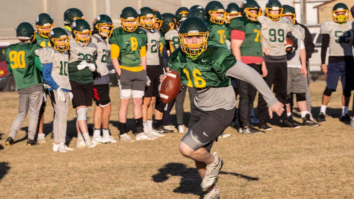 The Richland High School Bombers football team runs drills on their practice field before the 2021 football season. (File)