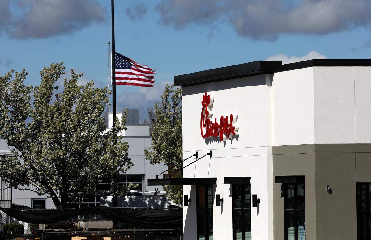 Signs have been installed as crews work on the new Chick-fil-A restaurant on Canal Drive in Kennewick.