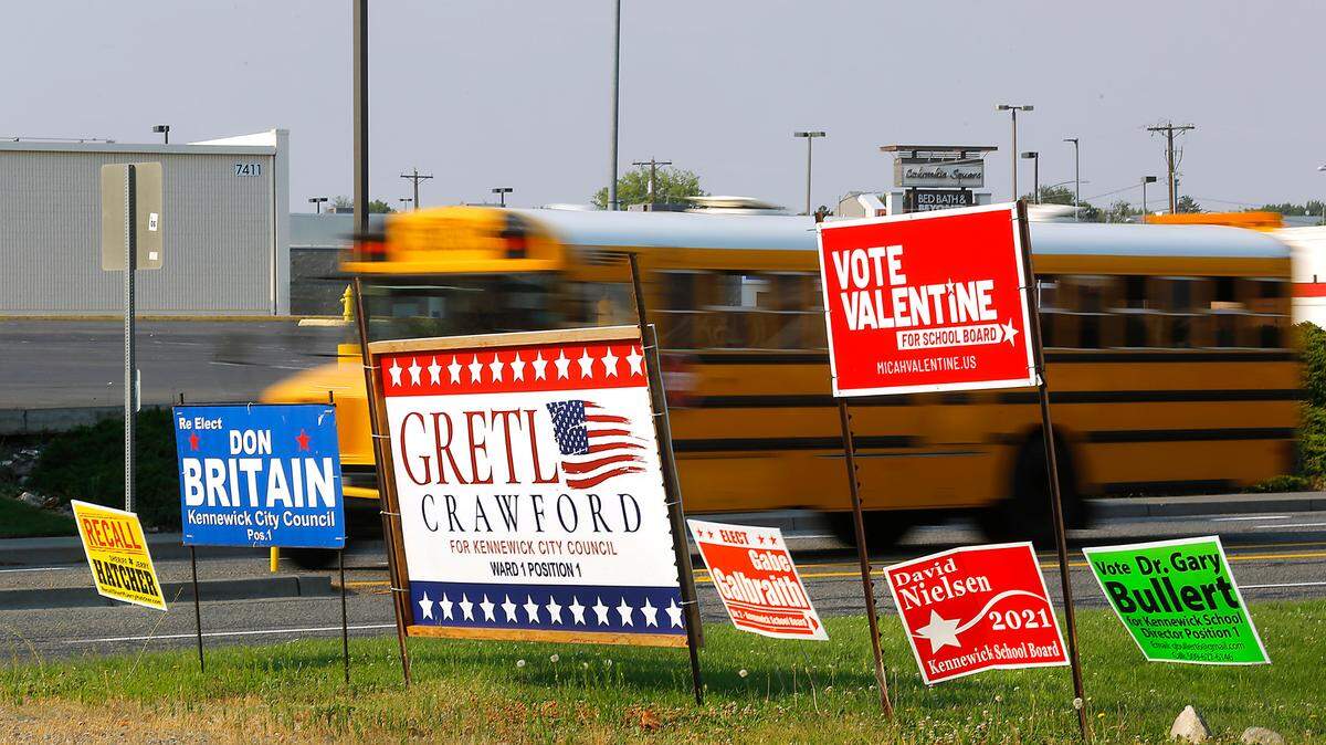 A variety of election signs are grouped along side West Canal Drive near Columbia Center Boulevard for voters to see in west Kennewick. Ballots for the August primary election must be postmarked or returned on or before Election Day, August 3. No postage is required for ballots returned via the US Postal Service.
