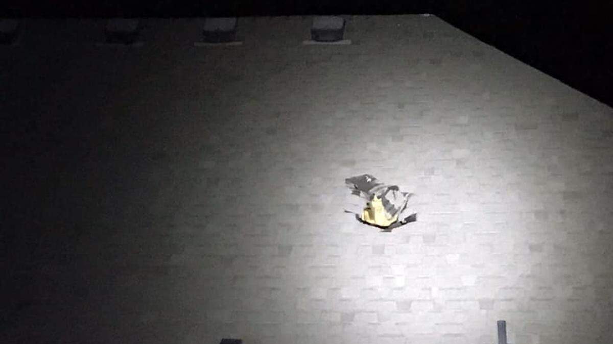 A tire crashed through a roof of a 20th Avenue home late Friday. Police are trying to find the owner.