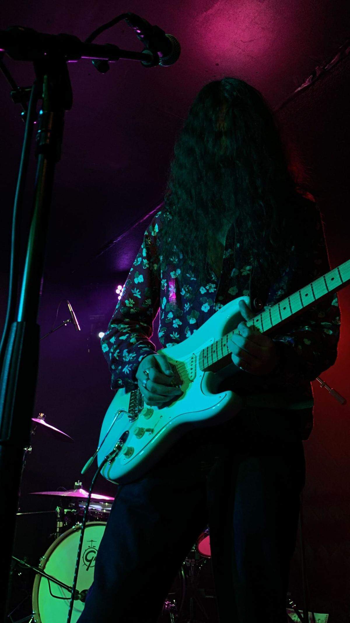 Luke Vesely, 21, plays rythym guitar for easyday at a Ray’s Golden Lion concert Feb. 9.