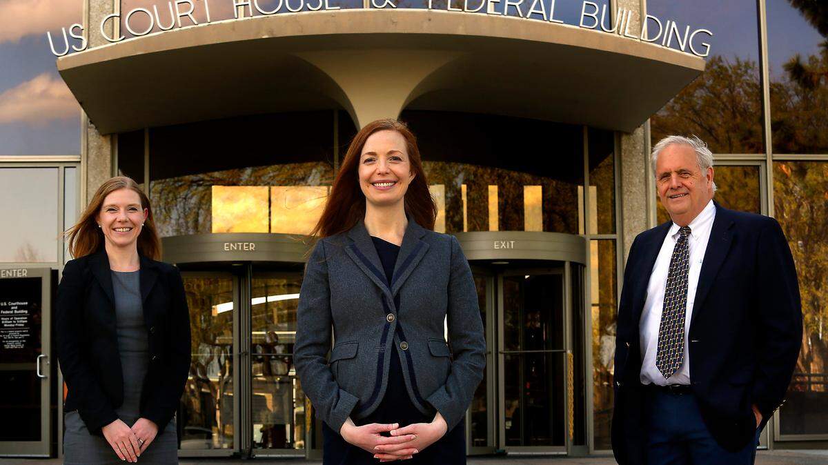 Laurel Holland, a Benton County deputy prosecutor, was named as an assistant to the U.S. Attorney in prosecuting child sex abuse cases. She is flanked by Benton County Prosecutor Andy Miller, right, and Vanessa Waldref, U.S. Attorney for Eastern Washington, recently outside of the Federal Building in Richland.