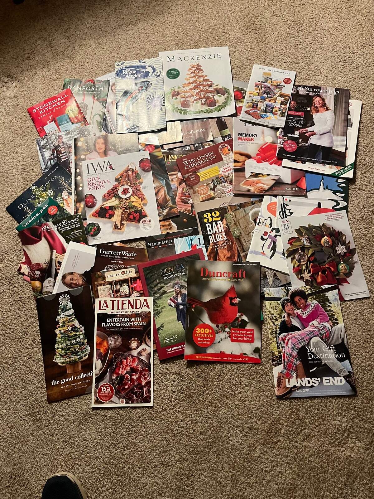 Looking through a pile of holiday catalogs can save the trouble of competing with frenetic crowds for a gift at the mall.
