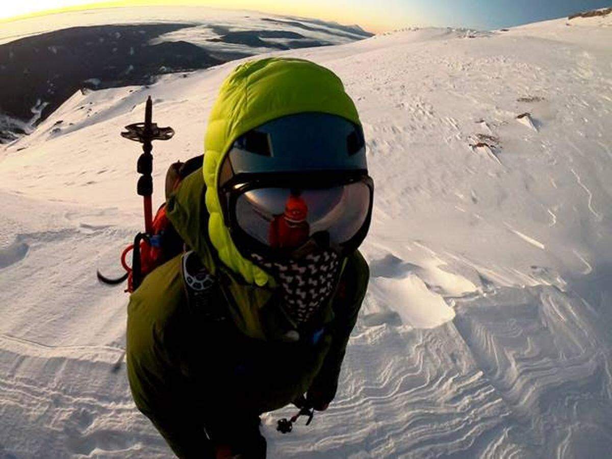 Close-up of Dustin Wintczak climbing on the ridge below the Mount Hood summit.