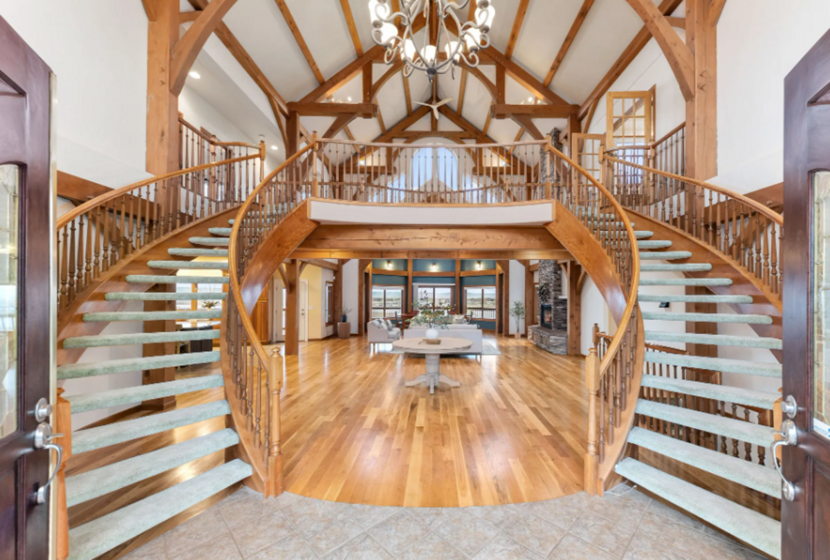 The custom built home has six bedrooms, 4.5-plus bathrooms and a soaring cathedral ceilings.