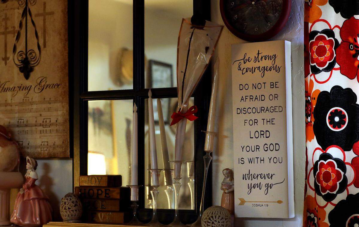 Diane Alaniz Anzar has decorated her supportive housing studio apartment in downtown Kennewick to reflect her Christian faith that she credits helping her recovery from addiction to drugs and alcohol.
