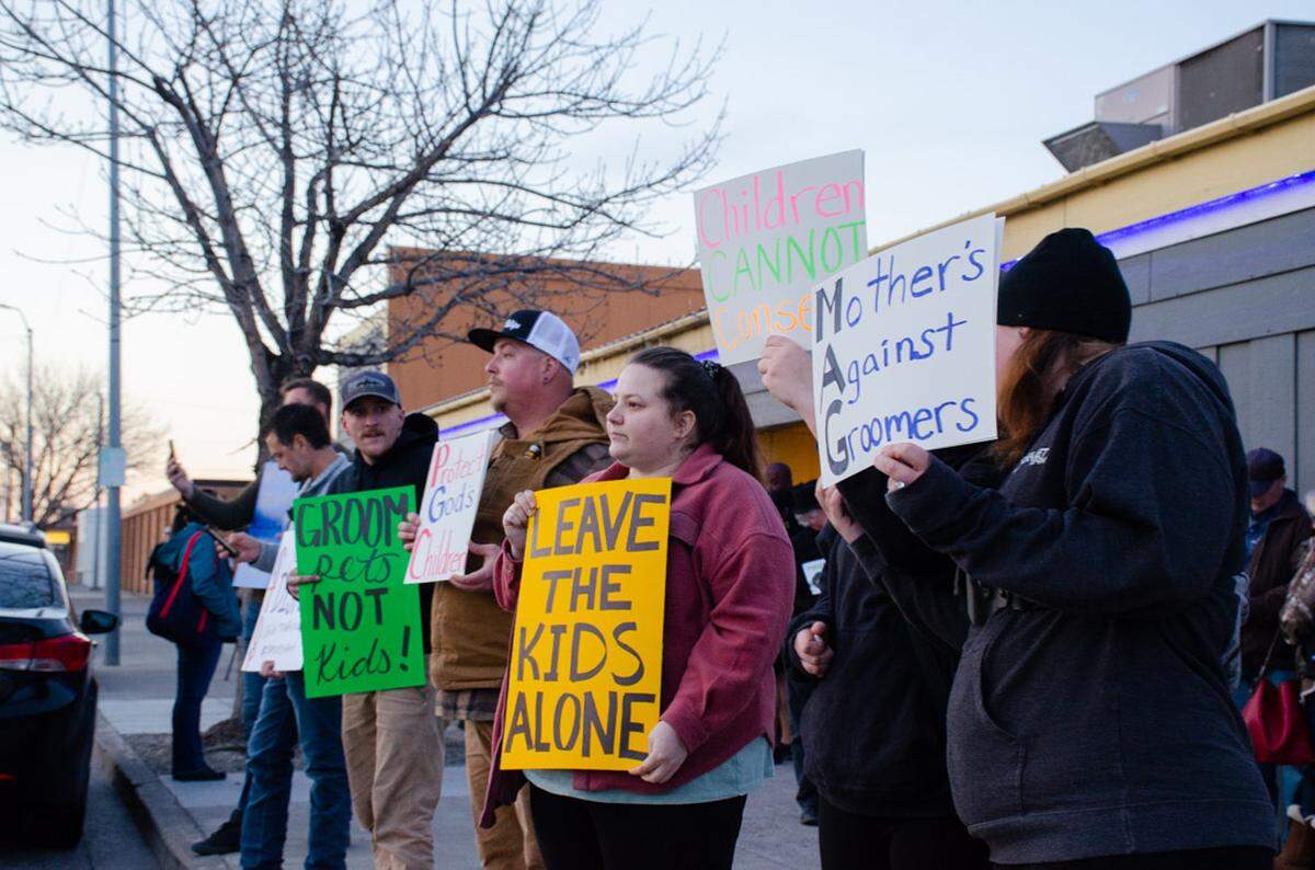 Protesters gathered Wednesday night outside Out and About night club in Pasco, WA in opposition to an all-ages Disney themed drag show. 