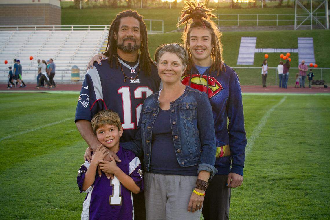 The Slack family stand inside Fran Rish Stadium in RIchland. From the bottom left, Anderson, 6, Leo Slack, Tiffany Slack, center and Darian Slack.