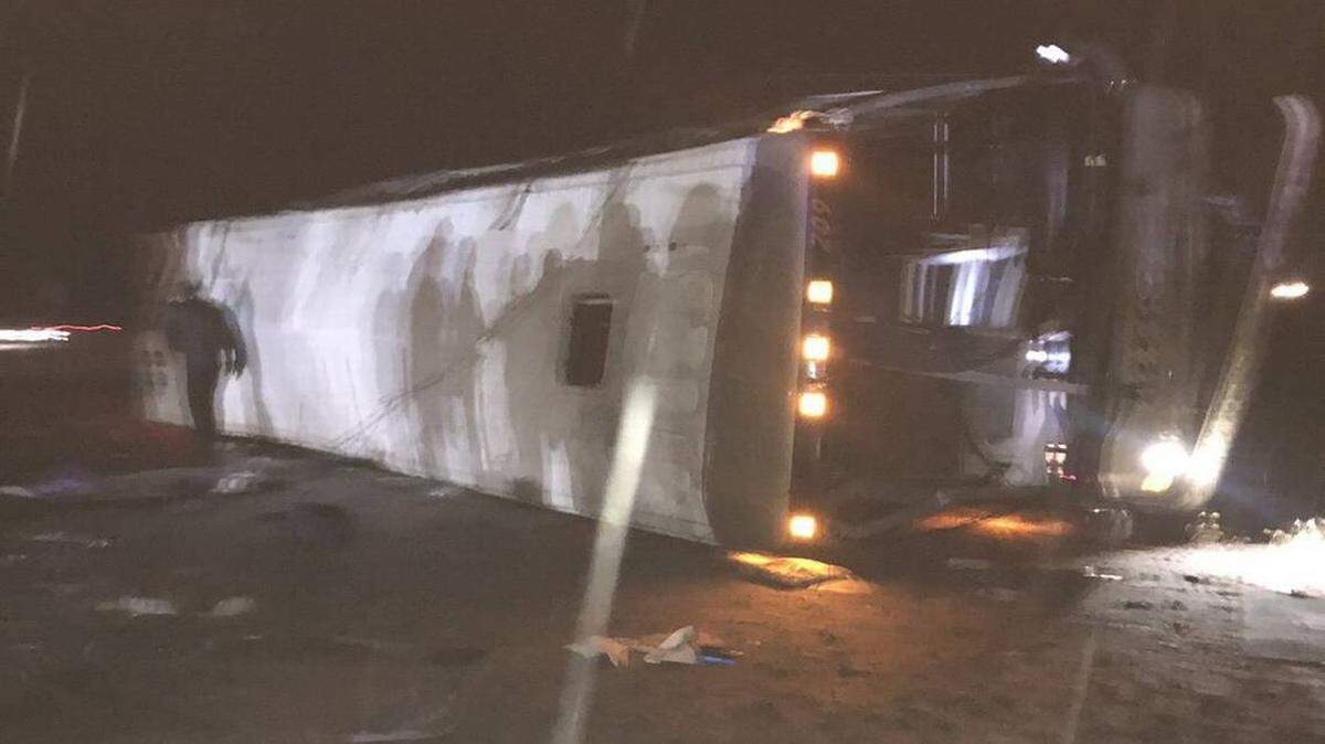 A bus carrying members of the University of Washington marching band to the Apple Cup rolled near George, Wash., on Thursday night.