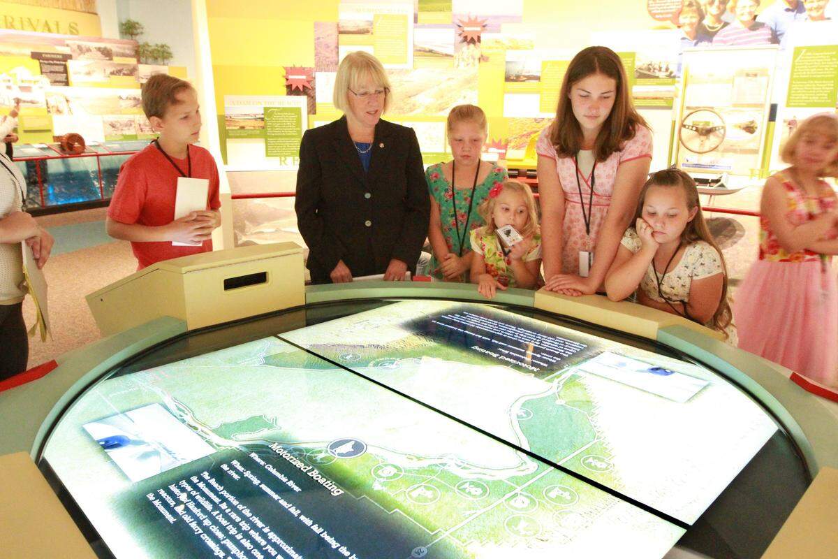 U.S. Senator Patty Murray tours the Reach museum in Richland before its 2014 ribbon cutting.