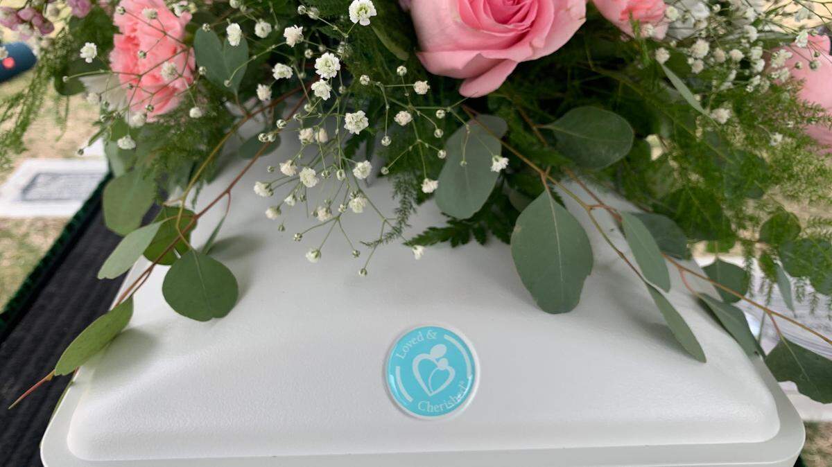 The casket for Baby Girl Doe, found in a bag in early March on the side of the road, was made possible by anonymous donors. The casket reads “Loved & cherished.” 