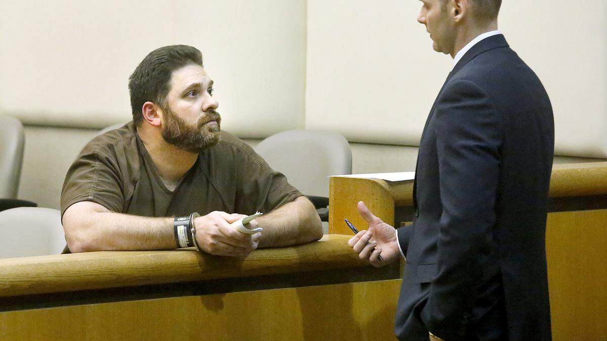 Jonathan P. Holden, 44, is considering a guilty plea that will involve federal and state cases for child pornography and attempted enticement and child rape. The Mead man, pictured earlier this year in Benton County Superior Court, has been a focus of a task force since he allegedly drove to the Tri-Cities to have sex with a 13-year-old girl.