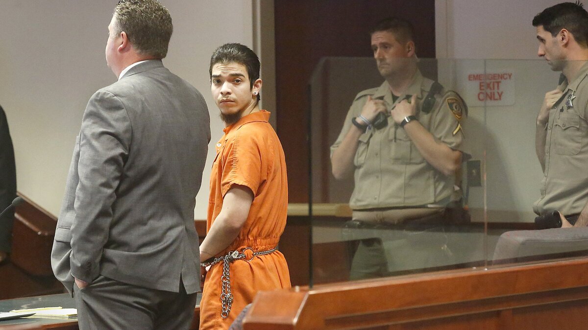 Valentin A. Castrejon glances around the Franklin County Superior Courtroom Friday morning during his sentencing conducted by Judge Bruce Spanner. Castrejon's defense attorney, Scott Johnson, stands next to him.