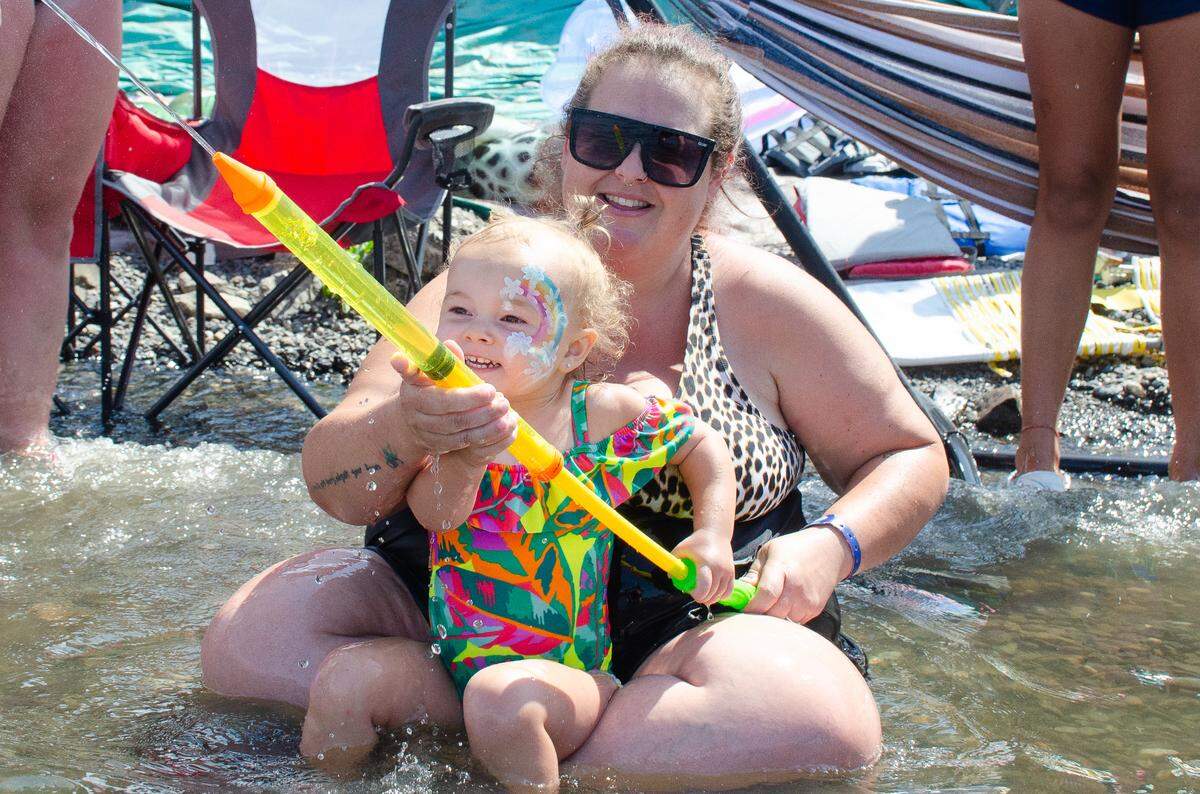 The Columbia River provided a cool refuge for families who came out championship Sunday, July 30, 2023, to watch the final hydroplane races of the Water Follies 2023 Columbia Cup.