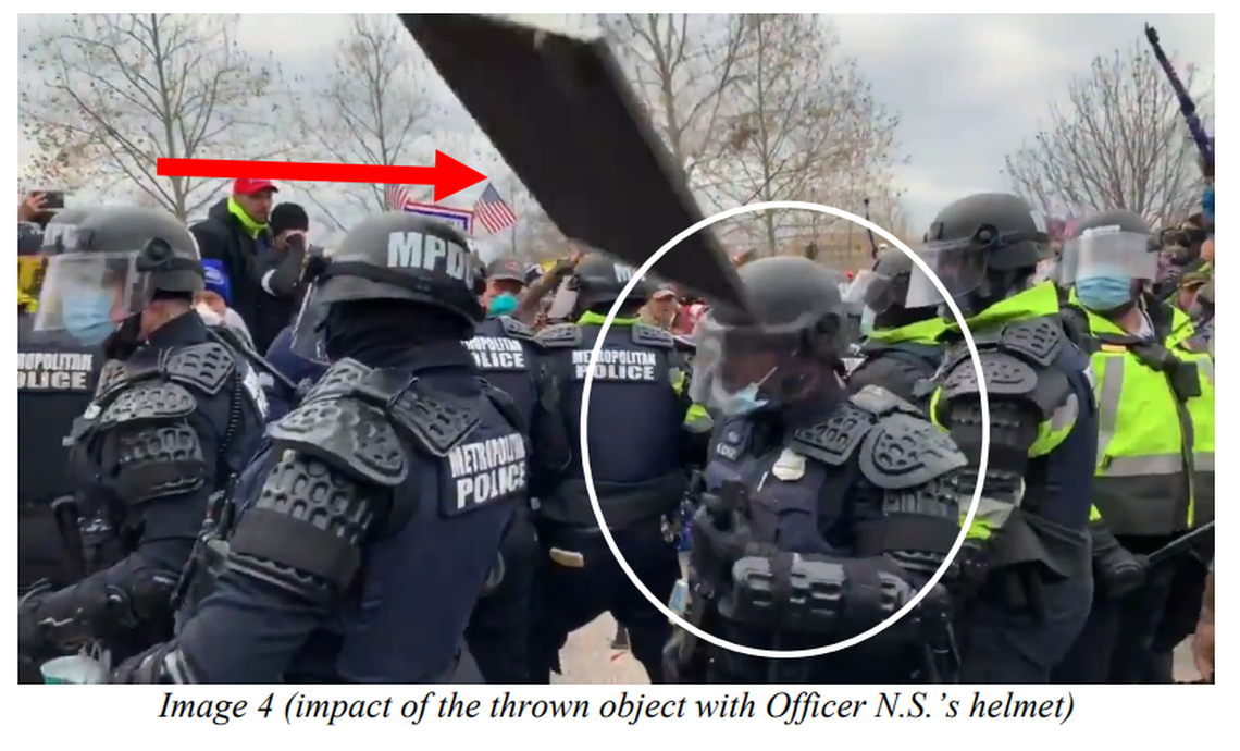 Court documents show the moment a D.C. Police Officer is hit in the head by a panel thrown by a Pendleton, Ore. Proud Boy.