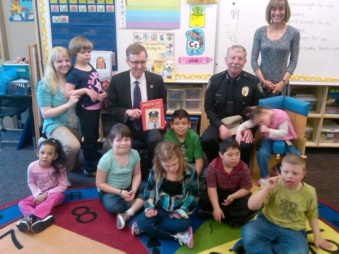 State Attorney General Rob McKenna and Hohenberg visited the life skills class at Southgate Elementary School in Kennewick to read to students in 2012.