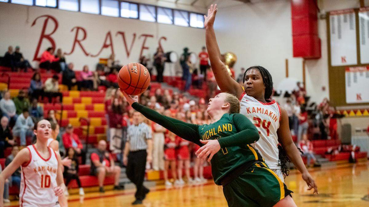 Kamiakin’s Mia Howard (24), seen here against the Richland Bombers, scored 16 points Friday in the Braves loss to Camas.