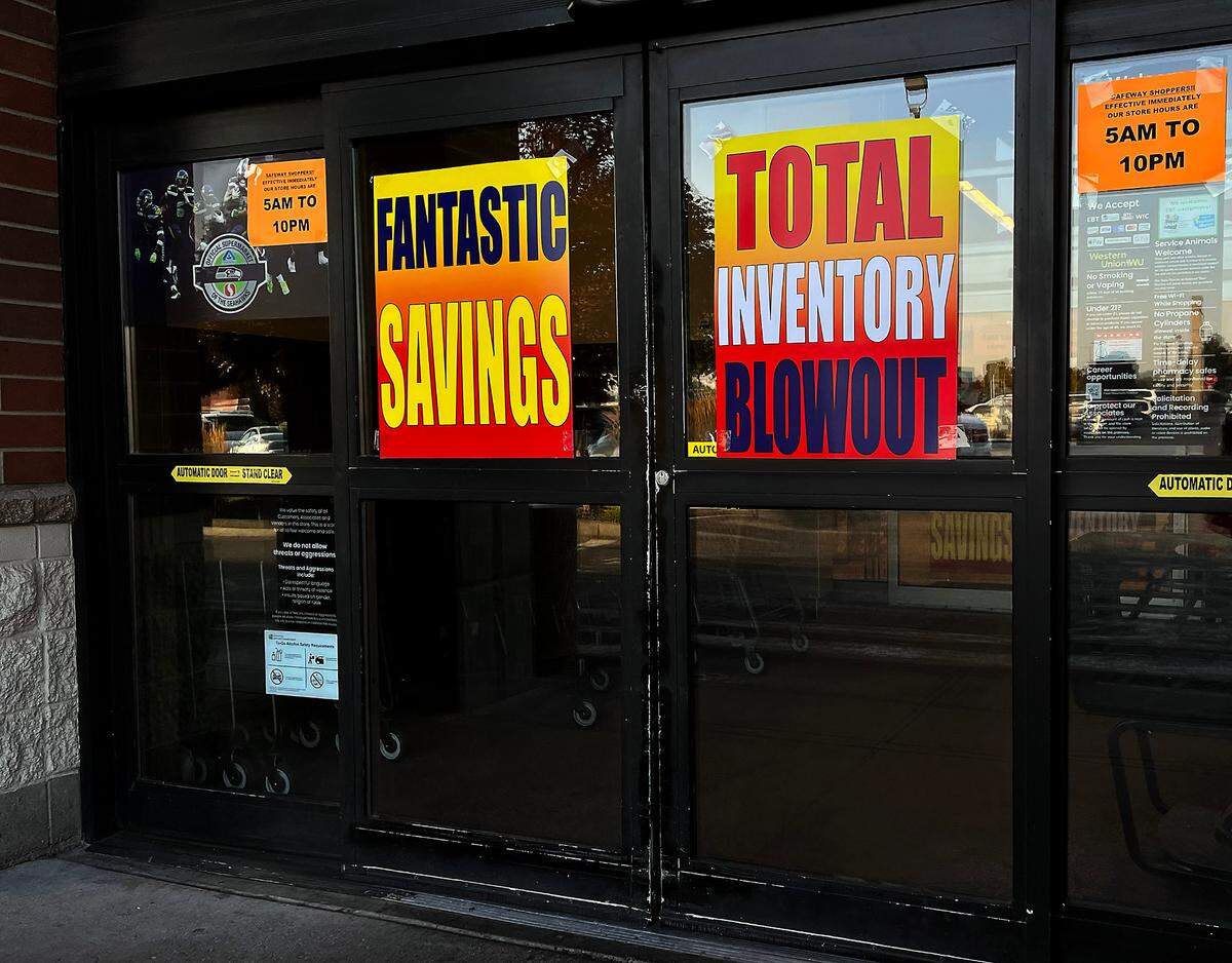 Signs on doors of the Safeway grocery store at 2825 W. Kennewick Ave. in Kennewick, WA.