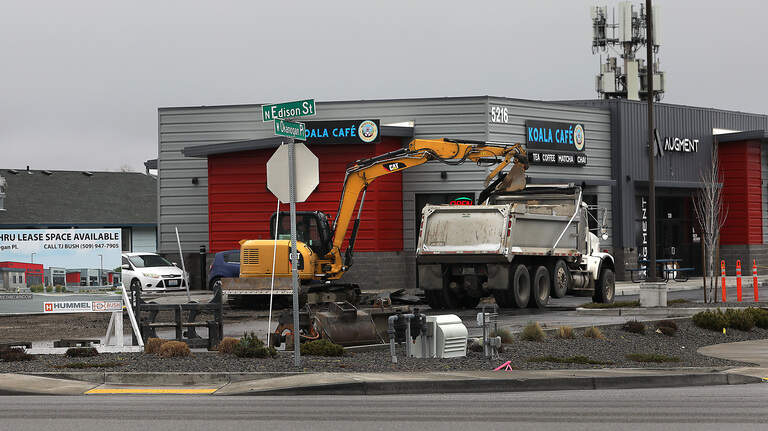 What’s being built there? Goodbye food truck plaza + Queensgate townhomes