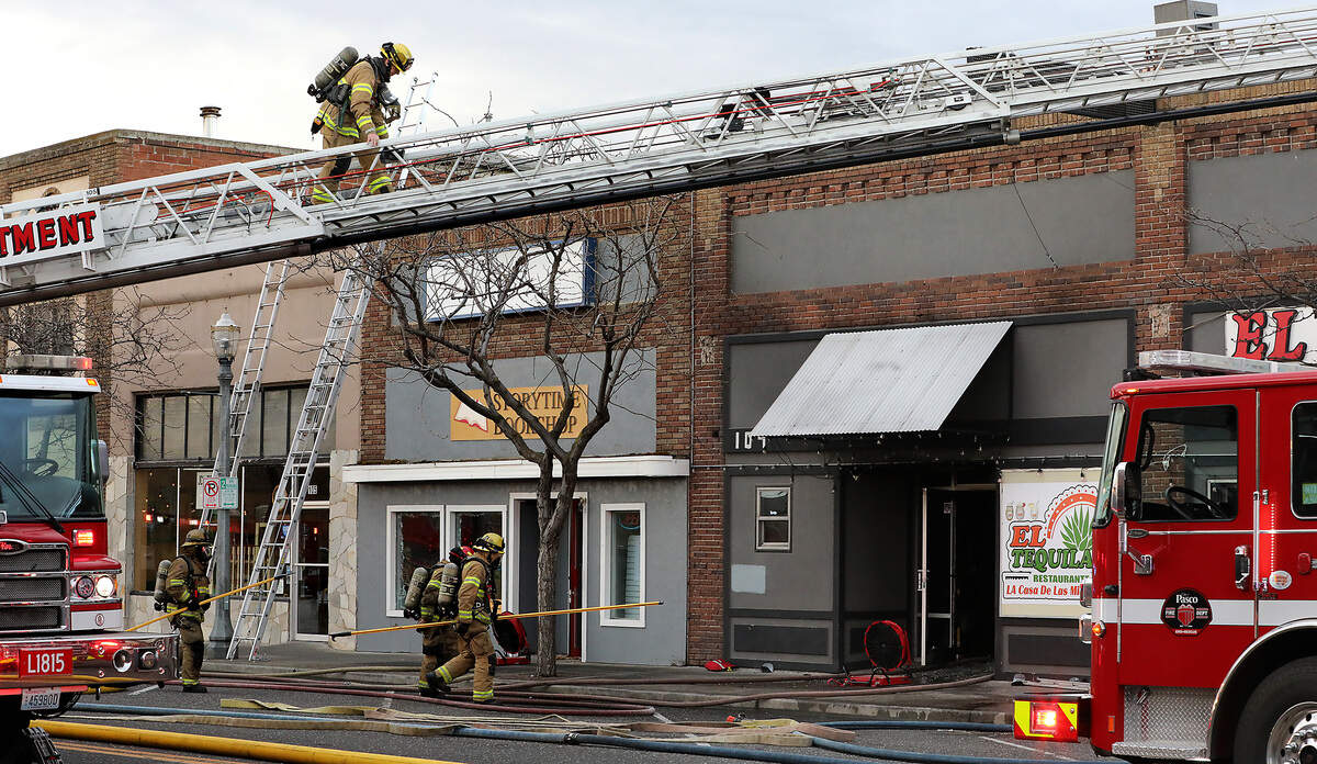 Firefighters from around the Tri-Cities work early Tuesday morning to extinguish a fire at the El Tequilas Restaurant in downtown Kennewick.
