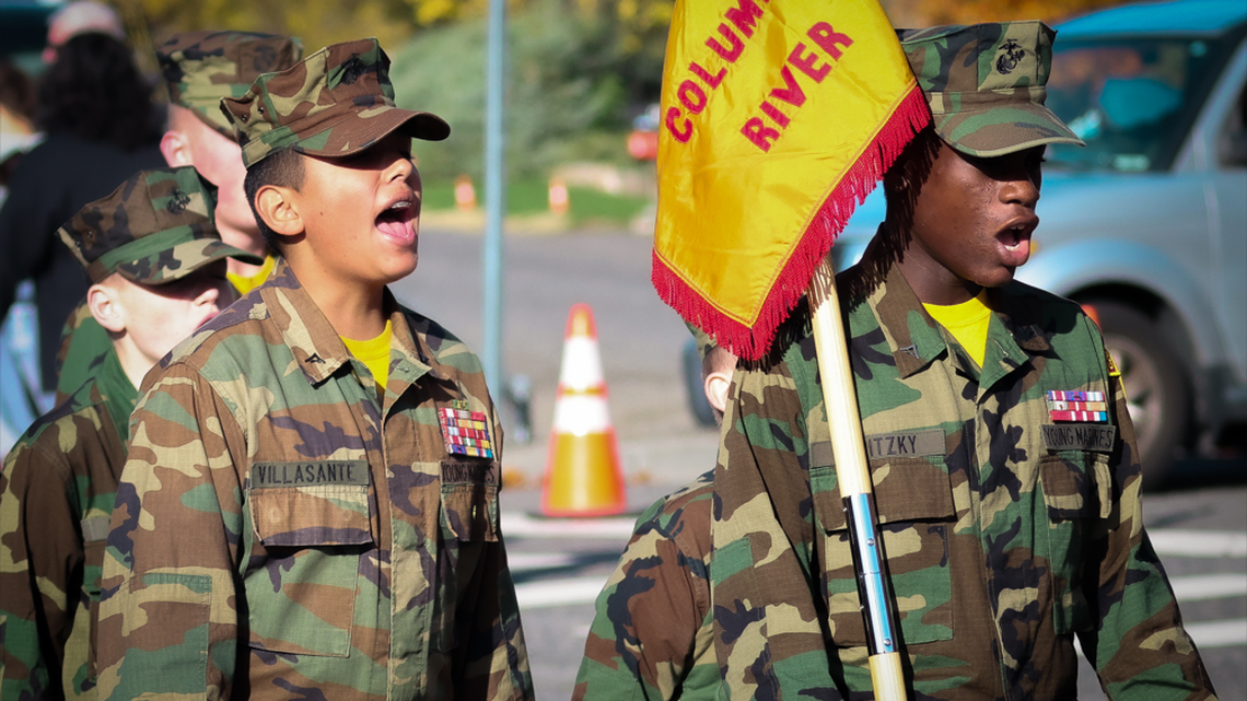 Members of the Columbia River Young Marines march down West Van Giesen Street during the 26th annual Veterans Day Parade in West Richland, Wash., on Saturday, Nov. 8, 2025.
