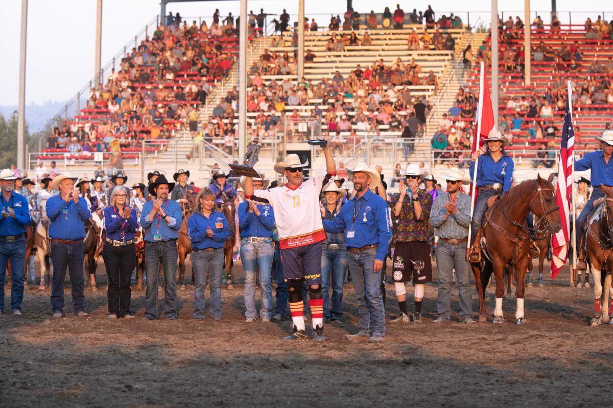 Rowdy Barry, center, was inducted into the Omak Stampede Hall of Fame this summer.