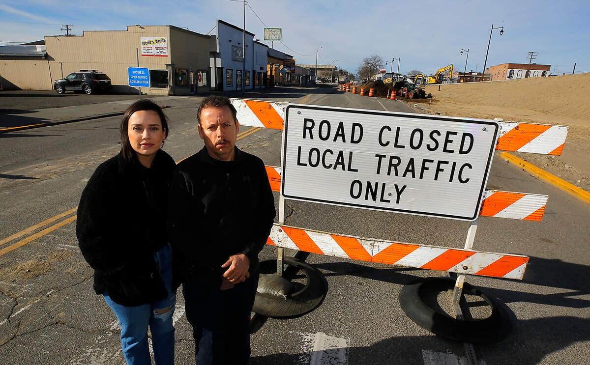 Ramiro Torres, owner of Lewis Street Tires & Torres Auto Repair, stands with his daughter, Valerie Torres.