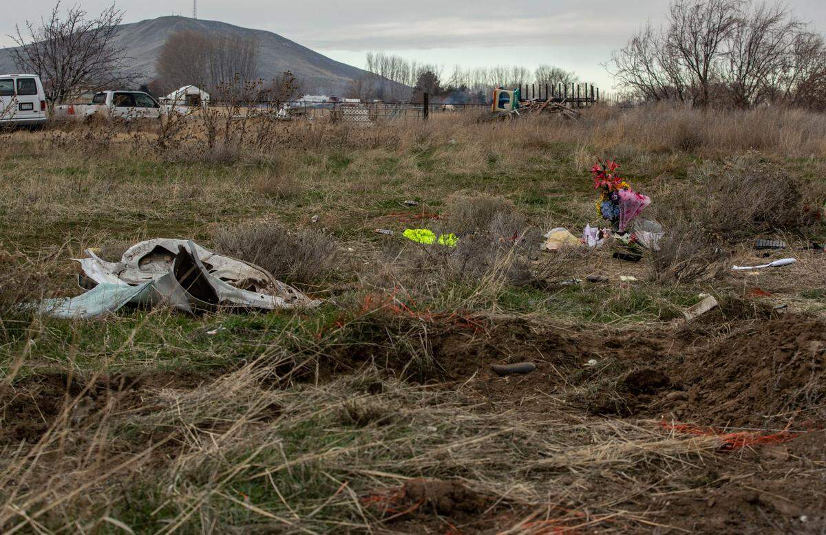 A memorial for Bryanna L. Campbell sits among the debris of the rollover crash that killed the 21-year-old woman on East Toothaker Road, near Hover Park in Finley. A GoFundMe has been set up in support of Campbell’s family.