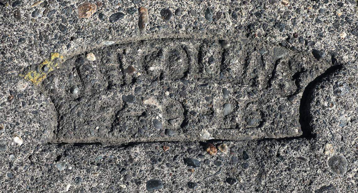 A historic concrete stamp dated from a century ago are interspersed on what’s currently named Columbia Park Trail in Kennewick’s Columbia Park.