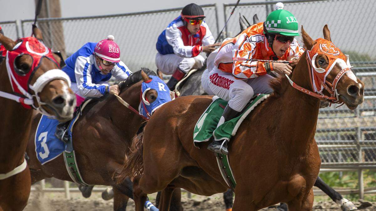 Horses race during the first weekend of this year's meet at Sun Downs in Kennewick. This weekend, the Kentucky Derby will highlight the schedule, and fans will be able to bet on the race and watch it at Sun Downs.